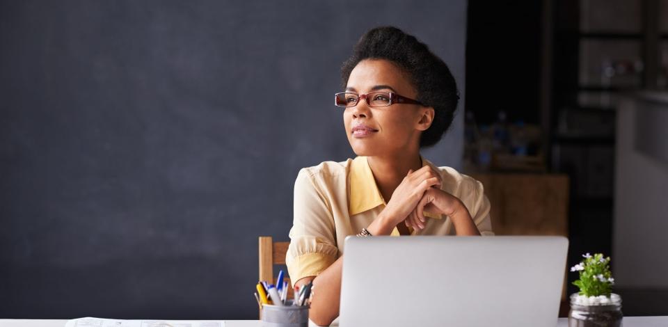 Cropped shot of a young businesswoman working on her laptop in the office